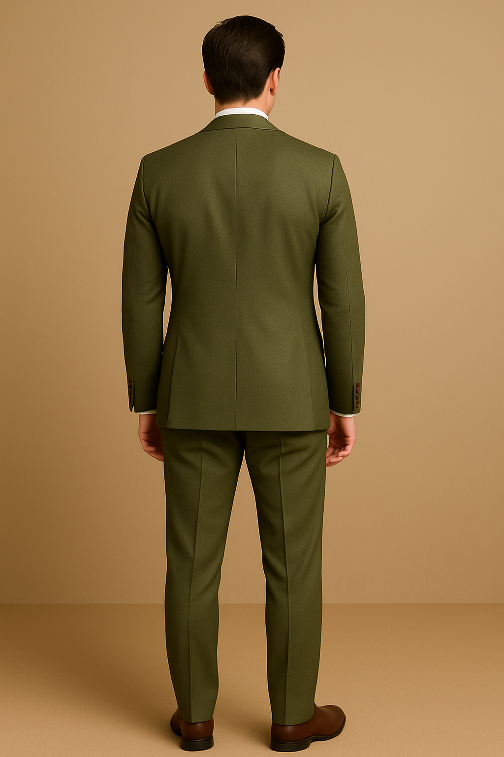 Man wearing a green suit against a beige background
