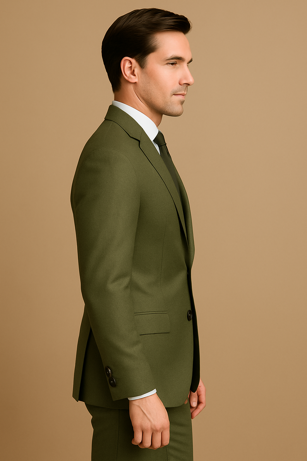 Man wearing a green suit against a beige background